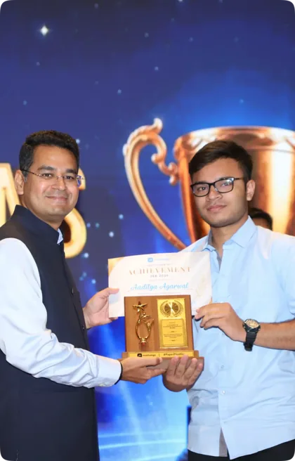 Aaditya Agarwal receiving his MathonGo JEE 2026 felicitation